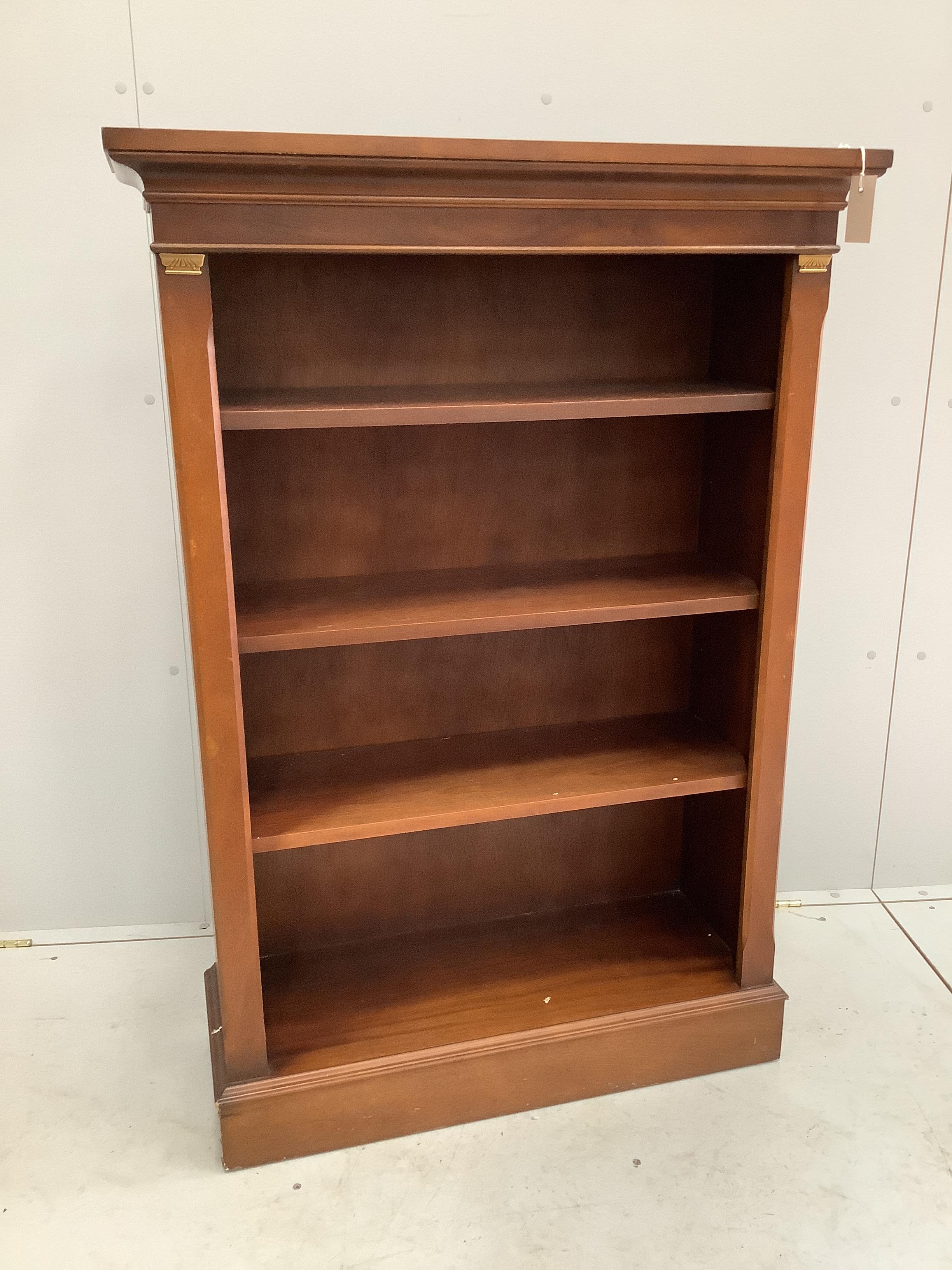 A reproduction mahogany open bookcase, width 84cm, depth 32cm, height 123cm